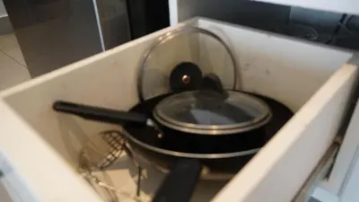 a frying pan in a drawer of a stove at Boutique Comfort 1BR T2-410 in Chalong