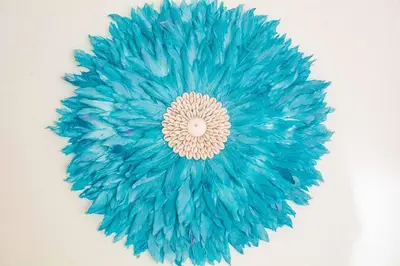 a blue flower with a white center at Amidst tropical plantations and striking mountain views in Ban Khlong Haeng