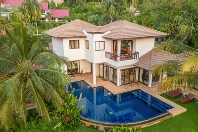 an aerial view of a house with a swimming pool at Surin 4-Bed Luxury Retreat with Private Pool V131 in Thalang
