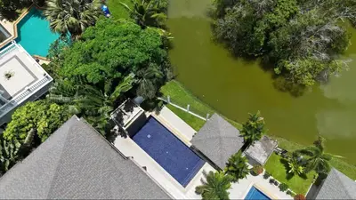 an overhead view of a house with a swimming pool at Lake view 3 bedrooms Pool Villa in Rawai Beach
