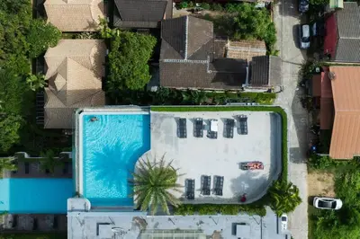 an overhead view of a swimming pool in a house at Fully Furnished Apartment - NV-622 in Chalong