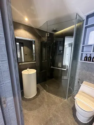 a bathroom with a shower and a sink and a toilet at 1BDR King size bed 3 Restaurants 500m to beach in Kamala Beach