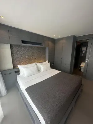 a bedroom with a large bed with white pillows at 1BDR King size bed 3 Restaurants 500m to beach in Kamala Beach