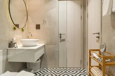 a bathroom with a sink and a shower at Title Halo Nature Touch 40m2 King Bed Naiyang in Nai Yang Beach