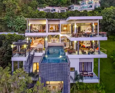an aerial view of a house with a swimming pool at Fully Serviced Grand Villa Luxury Time Phuket in Bang Tao Beach