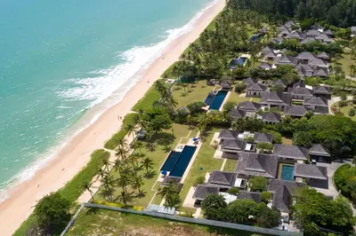 an aerial view of a resort next to the beach at Villa Ananda at Jivana Beach Villas in Pilai Beach