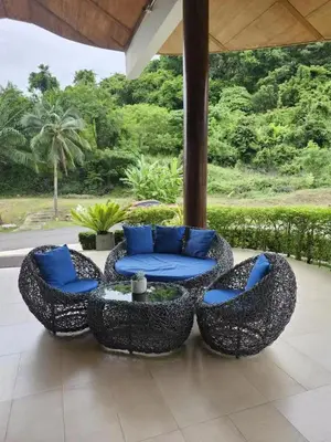 two chairs and a table on a patio at Veloche Karon 12 in Karon Beach