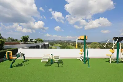 a group of playground equipment on a roof at Sky Park condo 1 bedroom in Laguna Phuket