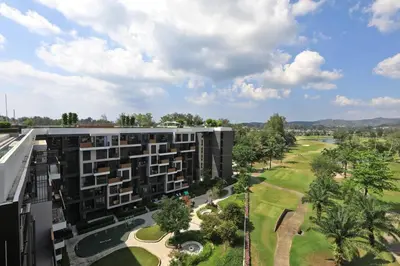 an aerial view of a building with a park at Sky Park condo 1 bedroom in Laguna Phuket