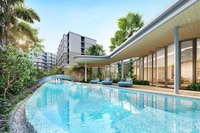 a swimming pool in front of a building at Dcondo Reef Modern Condos 1&2 Bedrooms in Kathu