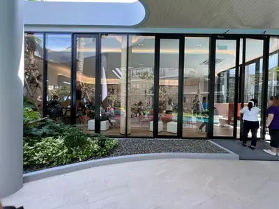 a rendering of a building with large glass windows at Dcondo Reef Modern Condos 1&2 Bedrooms in Kathu
