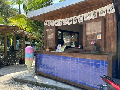 a kiosk with an ice cream cone in front of it at Title Halo Life in Yellow 40m2 King Bed Pool in Nai Yang Beach
