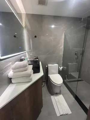 a bathroom with a toilet and a sink and a shower at Zcape 2 Boat Avenue, Laguna Brand New Renovated One bedroom Apartment with the Mountain View in Bang Tao Beach