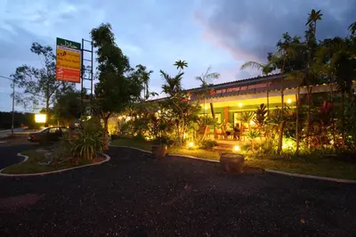 a building with lights in front of it at night at Bida Daree Resort in Ao Nang Beach