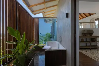 a bathroom with a sink and a large window at \u67e5\u9f993\u5367\u5ba4\u534a\u5c71\u6d77\u666f\u522b\u5885 in Ban Na Kok