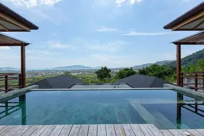 a swimming pool with a view of the mountains at \u67e5\u9f993\u5367\u5ba4\u534a\u5c71\u6d77\u666f\u522b\u5885 in Ban Na Kok