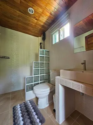 a bathroom with a toilet and a sink at Tiny 1-2 in Rawai Beach