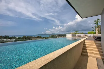 a swimming pool on top of a building at Apartment in Mida Grande Surin in Surin Beach