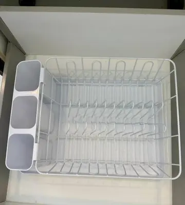 an empty shelf in an empty refrigerator at Poolside 1 Bedroom Apartment by Renttini in Surin Beach