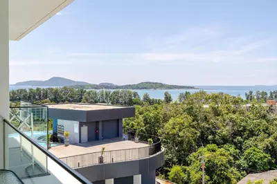 a house with a view of the ocean at Apart Close to the Beach Sea view in Rawai Beach