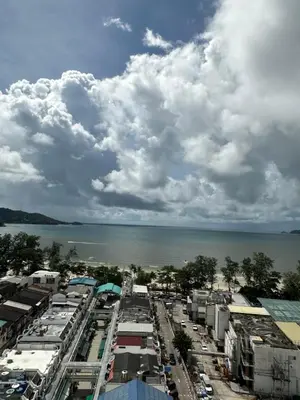 an aerial view of a city with the water at Patong Tower Apartments sea view 2B in Patong Beach