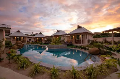 a villa with a swimming pool in a resort at The Hidden Lagoon Resort - Exclusively for Adults in Rawai Beach