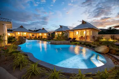 an image of a swimming pool in a house at The Hidden Lagoon Resort - Exclusively for Adults in Rawai Beach