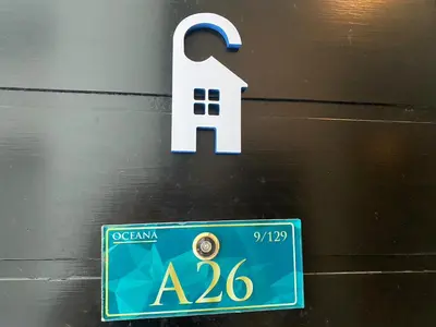 a sign with a number on top of a door at A26 Oceana Kamala in Kamala Beach
