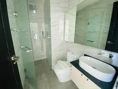 a bathroom with a sink and a toilet and a shower at A43 Oceana kamala in Kamala Beach