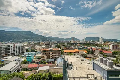a city view from the roof of a building at Private sea view apartment at Emerald Terrace in Patong Beach