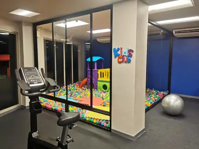 a room with a play room with a ball pit at Veloche Karon palm in Phuket Town