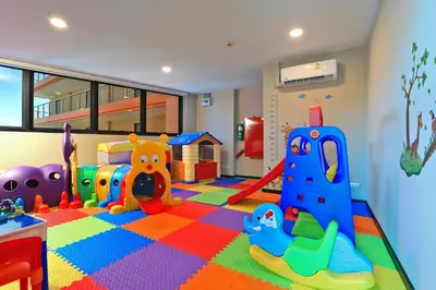 a childrens play room with toys on the floor at Mai Khao Beach Condo by Capital Pro in Mai Khao Beach