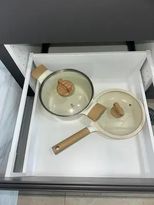 two measuring utensils sitting in a drawer at Apartment Karon SeaView 72 sq in Karon Beach