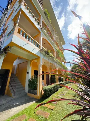 a view of the front of a house at Mood Resotel Kamala in Kamala Beach
