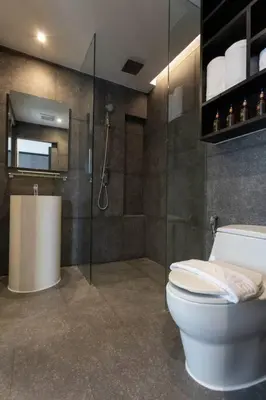 a bathroom with a toilet and a shower at Fully Loaded Resort everything You Need #C142 in Kamala Beach