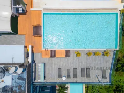 an overhead view of a swimming pool at Oceanstone Condo 2 bedrooms BangTao Laguna in Bang Tao Beach