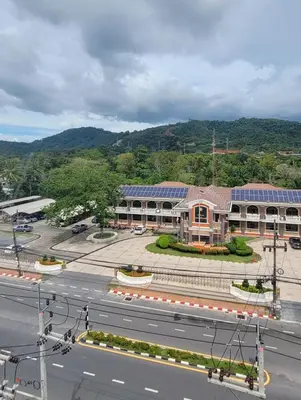 an aerial view of a building with solar panels on it at Centrally located new and affordable condo for the first mover in Ban Ket Ho