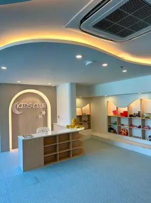 a room with a store with a counter in it at La Vita Stylish apartment in 5 star hotel in Rawai Beach