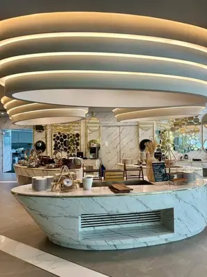 a counter in a kitchen with a large counter top at La Vita Stylish apartment in 5 star hotel in Rawai Beach