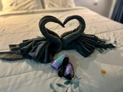 two swans making a heart on a bed at \u30a2\u30de\u30c6\u30e9\u30b9\u30d1\u30c8\u30f37 in Patong Beach