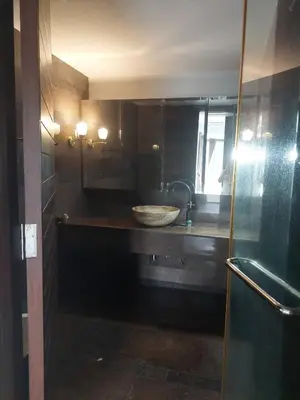a bathroom with a sink and a bowl at The green golf resident 106 in Kathu