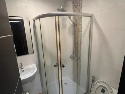a bathroom with a shower and a sink at VILLA AP Grand Residence in Kamala Beach