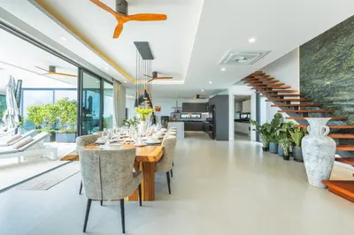 a dining room with a long table and chairs at 