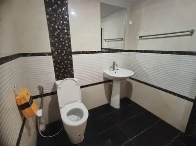 a bathroom with a toilet and a sink at Bonanza Patong Beach2 for 2 BR 100m to Beach Grand Room in Patong Beach