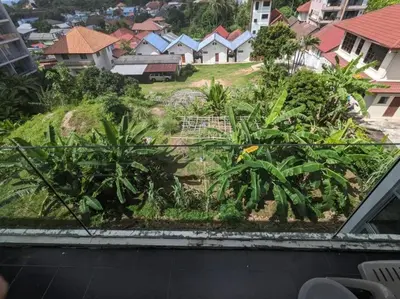 a view from a window of a city with houses at Chic Condominium Karon B511 in Karon Beach