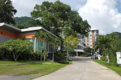 a building with a street in front of it at Chic Condominium Karon B511 in Karon Beach