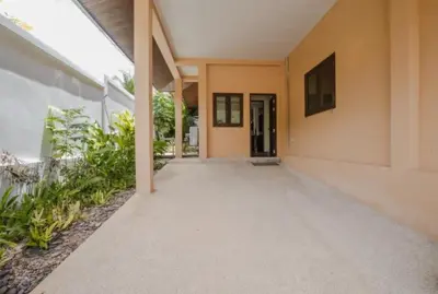 an empty corridor of a building with a hallway at NEW Phuket Residence 2 Bedrooms Charming House in Rawai Beach