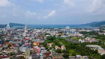 an aerial view of a city with buildings at \u82ad\u4e1cvilla3\u56db\u5367\u6d77\u666f\u6cf3\u6c60\u522b\u5885\u82ad\u4e1c\u6d77\u6ee9\u8fd1\u73ed\u8d5eBangla in Patong Beach