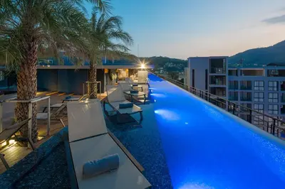 a swimming pool on the roof of a building at Junior Suite D37 Kamala Beach in Kamala Beach