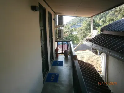 an empty hallway of a house with a stairway at Infinity Boutique Hotel Kata Beach in Kata Beach